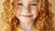 © Eduardo - Close-up portrait of a joyful young girl with curly hair.