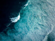 © C6 Studio/Stocksy - Top down aerial view of moody blue ocean wave