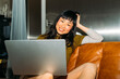 © Studio Firma/Stocksy - Asian woman with laptop