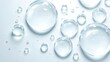© Saksit - Clear water droplets on a smooth, light surface with reflections and a clean, fresh appearance.