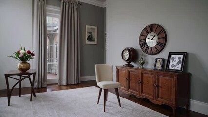 Poster - Elegant vintage dining room with wooden sideboard, large wall clock, round wooden table, floral centerpiece, chandelier