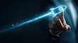 © weerasak - A person touches a glowing digital rocket, symbolizing innovation, technology, and startup growth.