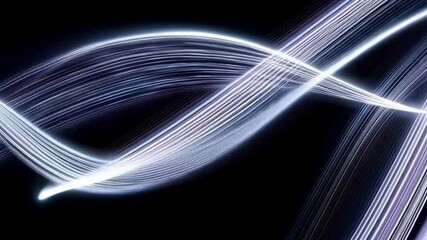 Smooth flowing ribbons of light weaving in a dark environment