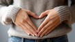 © Harry - Woman Hands Forming Heart Shape on Stomach Gentle Care Wellbeing Health Love SelfCare Body Positivity Stomach Health Wellness Peaceful Tenderness Calm Cozy Grey Sweater Female Care