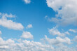 © Kristin Duvall/Stocksy - Clouds and blue sky