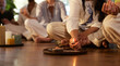© Rido - Lighting insence stick at wellness center