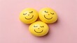 © ali - Dreamy yellow smiley faces offer silent wishes for serenity and happiness on soft pink background with clean