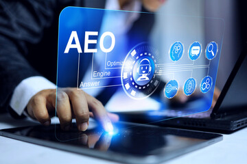 Wall Mural - answer engine optimization aeo concept with businessman using tablet to strategy for optimizing cont