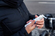 © Johnér - Close-up of woman holding asthma inhaler in hand