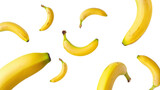 Plátanos o bananas esparcidas por el aire. Aisladas sobre fondo transparente. PNG.