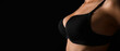 © Pixel-Shot - Young woman in bra on black background, closeup