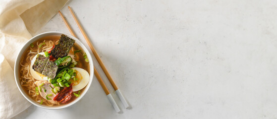 Wall Mural - Tasty Chinese soup with chicken in bowl on light background