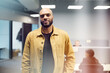 © Johnér - Portrait of confident bald businessman wearing jacket standing in office