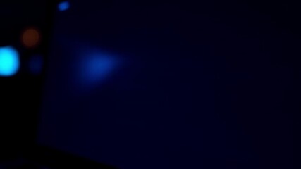 Dynamic display of code text on a computer screen with glowing color