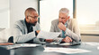 © peopleimages.com - Finance, meeting or business people with paperwork for planning for teamwork, contract or budget. Mature manager, document or financial advisor reading for accounting project, info or risk management