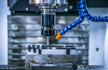 Wall Mural - cnc lathe milling machine cutting featuring high precision the metal part , the hi-technology parts 