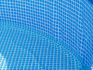 Poster - The blue pool is covered with a blue net