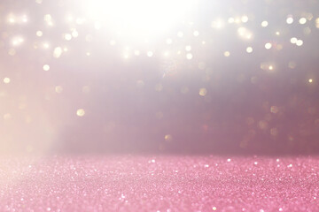 Wall Mural - abstract glitter pink and gold lights background. de-focused