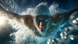 © Khawla - Underwater View of a Swimmer Performing the Butterfly Stroke