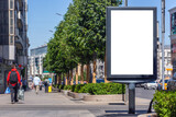 Vertical Blank billboard or signboard with copy space for content or text in the city street. Sunny day. Business mockup