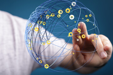 Poster - Abstract image of a hand interacting with a digital network sphere, representing global connectivity and data flow.