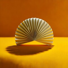 Poster - Elegant Paper Fan with Striking Shadow on a Vibrant Yellow Background, Minimalist Art and Design