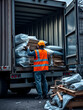 © Danielle - A construction worker unloading materials from a truck. Featuring efficiency and teamwork