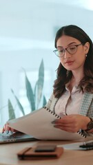 Aufkleber - Woman, laptop and documents at startup, typing and admin with project management at media company. Person, writer and editor with computer, paperwork and review for article with research at agency