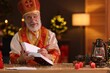 © New Africa - Saint Nicholas with notebook at desk in room decorated for Christmas