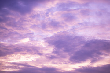 Wall Mural - dreamy purple sky background and clouds soft focus, and copy space