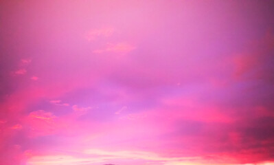 Wall Mural - dreamy pink - purple sky twilight background and sunlight with copy space, clouds soft focus