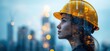 © Vergiliy - Female engineer with yellow hard hat and city skyline reflection in profile