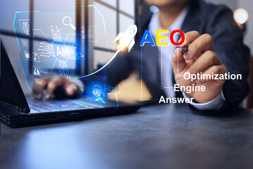 Wall Mural - answer engine optimization aeo concept with businessman writing on virtual screen to strategy for op