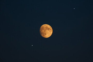 Canvas Print - waning gibbous moon photographed with a long focal lens.