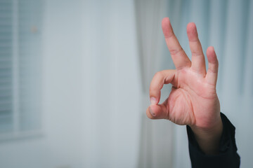 Aufkleber - Business hand gesture symbolizing success office setting close-up professional environment