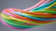 © Aris Suwanmalee - A vibrant collection of colorful wires twisted together, showcasing creativity.