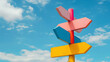© Taiwo - Colorful blank road sign direction arrows. Multicolor blank road sign arrows pointing to different directions under the blue sky during the day.