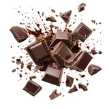 Melting chocolate squares burst into pieces with cocoa splashes