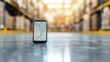© tashechka - Smartphone displaying map in warehouse showing delivery location accuracy