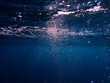 © boulham - Bubbles under the sea in the crystal clear green sea water. Mediterranean sea bubbles, Air bubbles underwater rising to water surface, natural scene, bubbles under water, bubble undersea, Blue water.