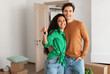 © Prostock-studio - House Ownership. Portrait Of Happy Young Couple Holding Showing Key Standing In New Flat, Cheerful Guy Embracing Lady Posing After Moving In Own Apartment. Insurance, Real Estate, Mortgage Concept