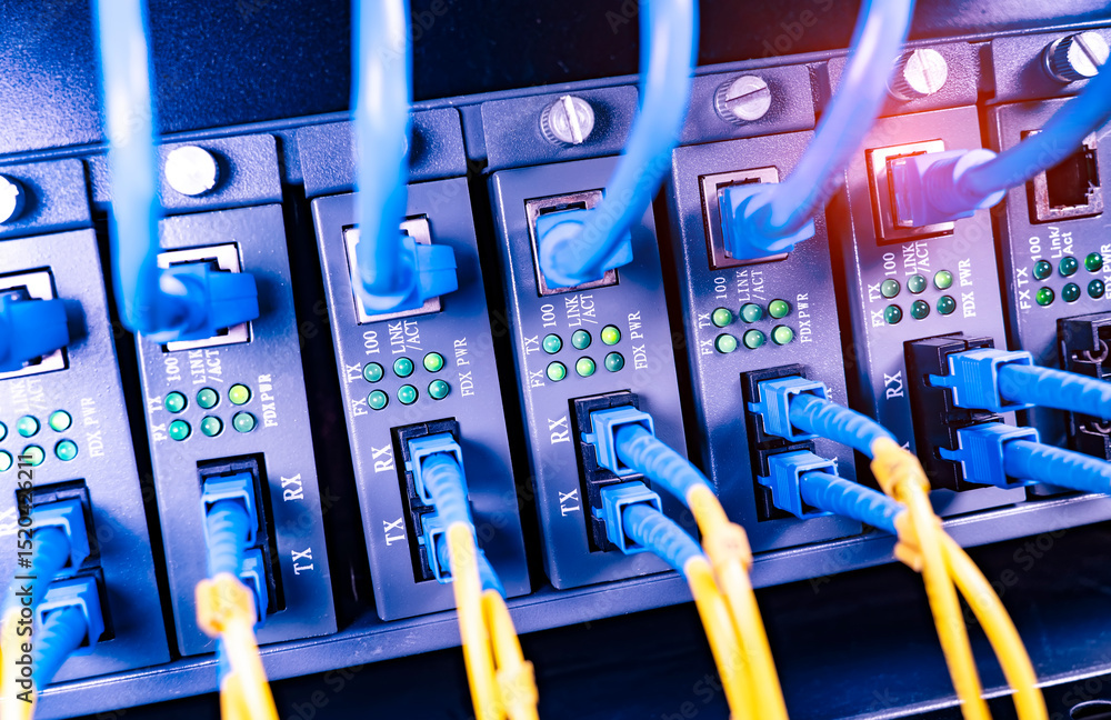 server with fiber optic cables and network cable in data center Stock ...