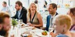 © Rawpixel.com - A diverse group of professionals, including a smiling blonde woman and a suited man, enjoy a lively lunch together. The atmosphere is warm and inviting, perfect for networking and socializing.