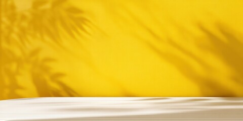 Poster - Empty white tabletop for product presentation with yellow background and leaf shadow creating a summer scene, perfect for showcasing products