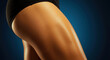 © NN AI - Woman thigh in black underwear on blue background. Female leg wearing dark lingerie against gradient backdrop. Beauty and body concept. Cosmetic services, skincare sale, body treatments