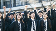 © shibadog - Smiles and fist pamping of uniformed asian students.