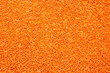 © Vera Aksionava - Here is a detailed close up image of a vibrant pile of orange glitter