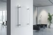 © EBBE - A pristine glass banner displayed against a clean white wall.