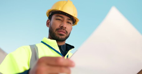 Poster - Low angle, man or builder on site for floor plan, engineering inspection or project management. Reading, think or contractor in construction job for city development with check, review or blueprint