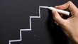© Eamin - Drawing stair steps with chalk on blackboard for growth and success idea
